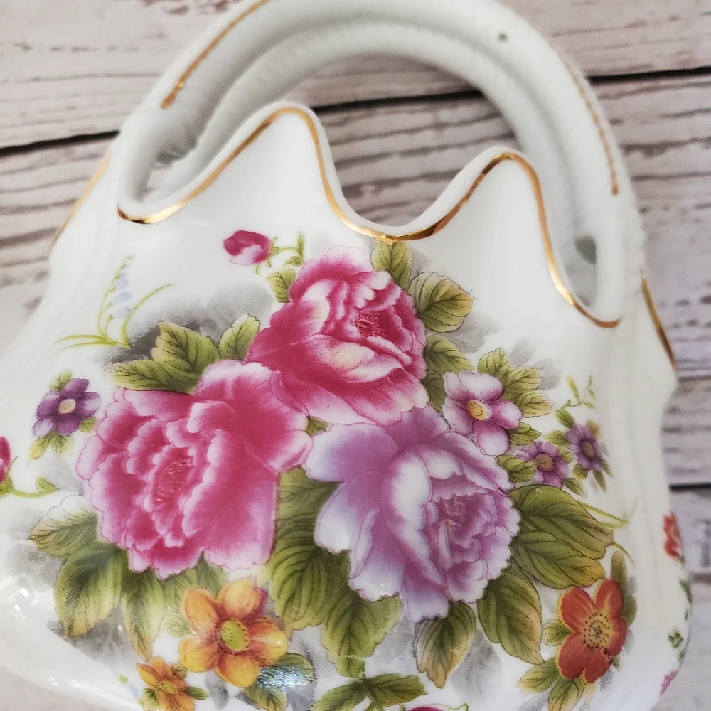Vintage porcelain basket with flowers on it white, pink, purple, green